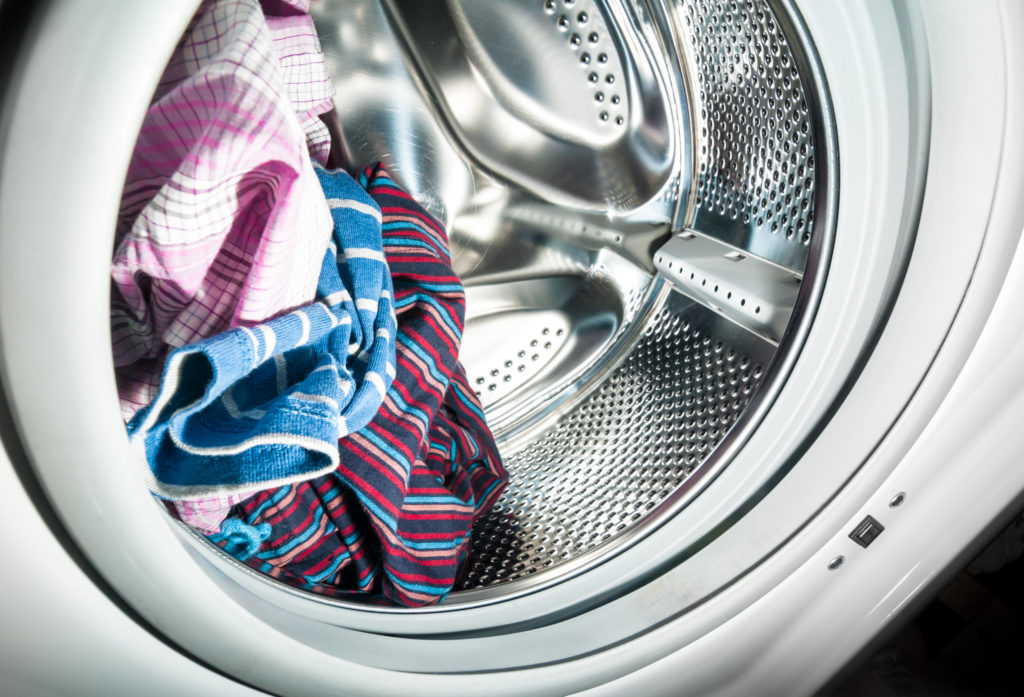 Laundry inside a washing machine drum